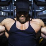 chest workout plan man using a chest press machine