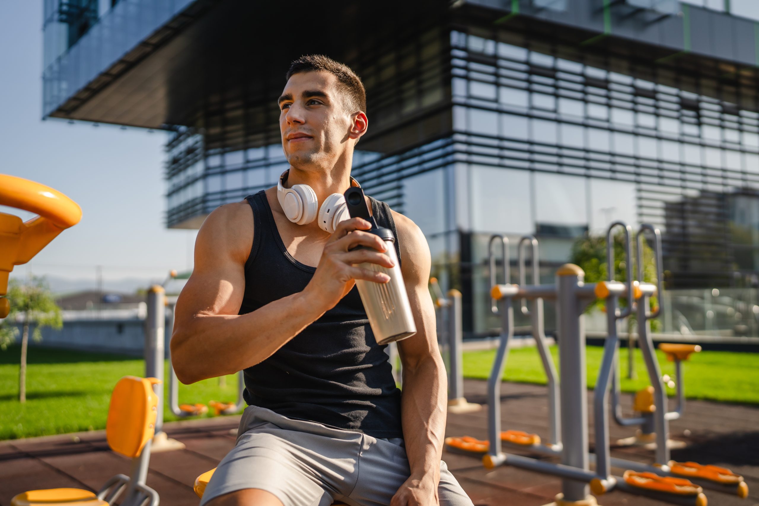 weight loss meal plan man drinking protein shake outside after a workout